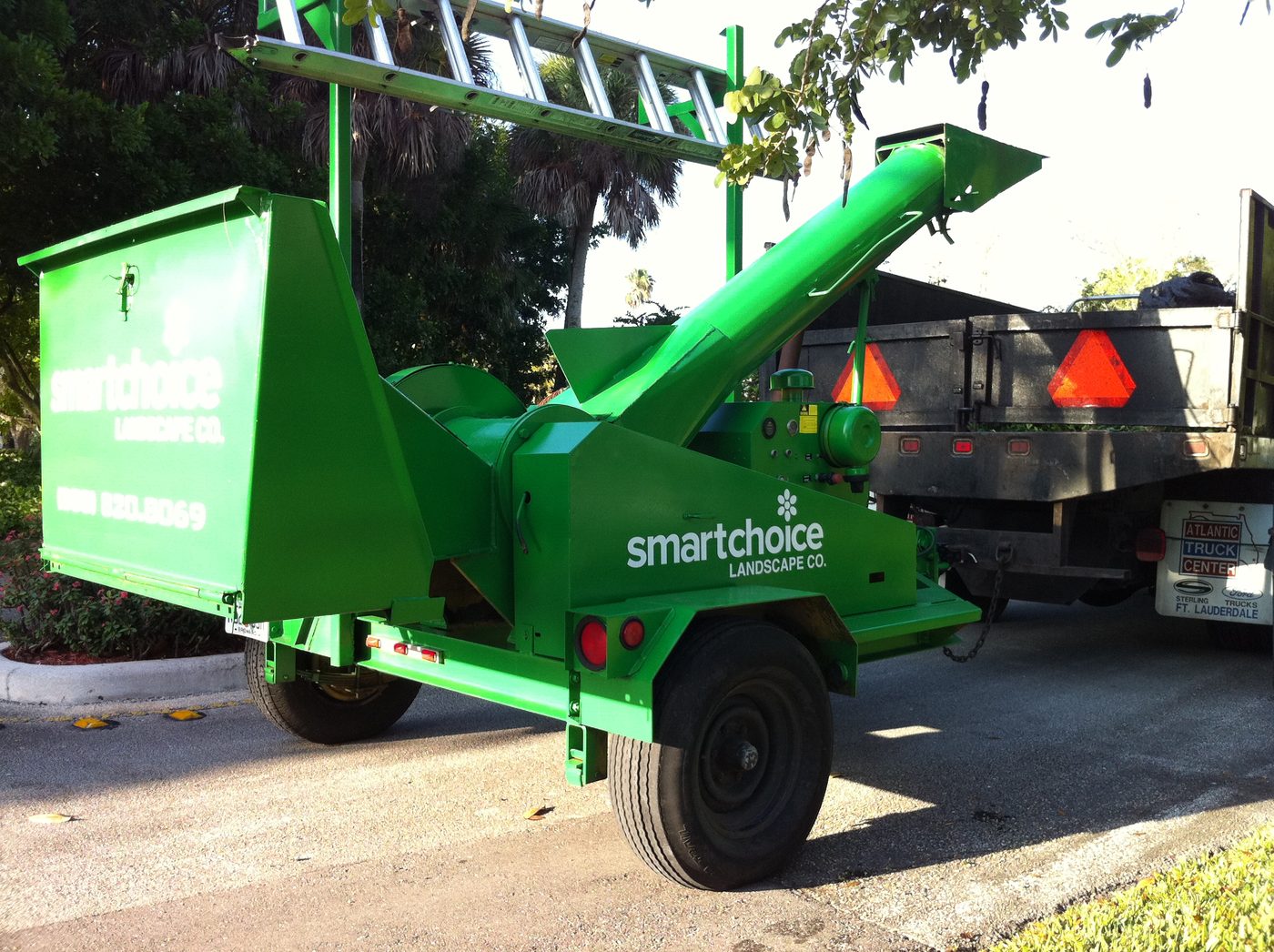 Smart Choice branded wood chipper on site